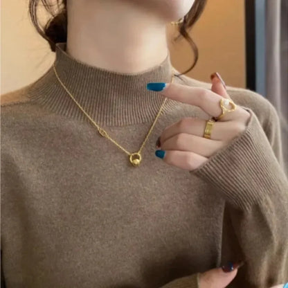 Maglione lavorato a maglia semi-dolcevita da donna